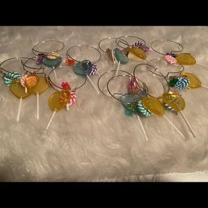 Girls candy charmadjustable bracelets.silver or gold. Each bracelet has 5 charms